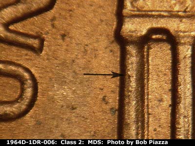 Die-stage B marker on 1964D•1DR•006 (1964 Doubled Die Reverse).