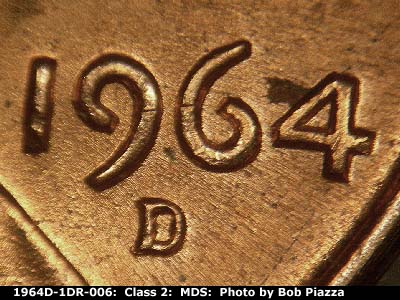 Die-stage B marker on 1964D•1DR•006 (1964 Doubled Die Reverse).