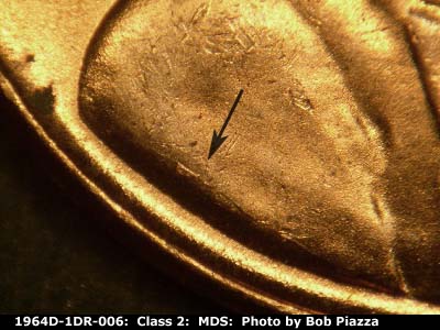Die-stage B marker on 1964D•1DR•006 (1964 Doubled Die Reverse).