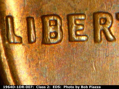 Die-stage A marker on 1964D•1DR•007 (1964 Doubled Die Reverse).