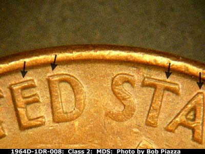 Die-stage B marker on 1964D•1DR•008 (1964 Doubled Die Reverse).