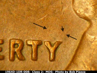 Die-stage B marker on 1964D•1DR•008 (1964 Doubled Die Reverse).