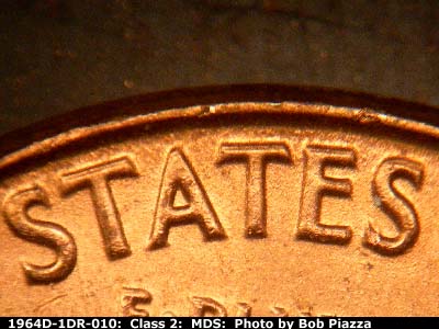 Die-stage B marker on 1964D•1DR•010 (1964 Doubled Die Reverse).