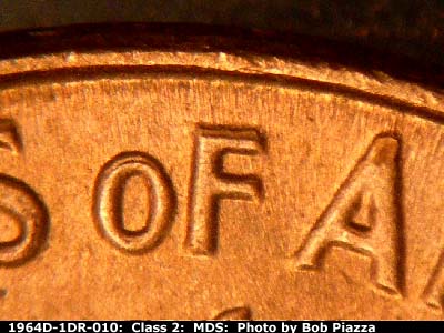 Die-stage B marker on 1964D•1DR•010 (1964 Doubled Die Reverse).