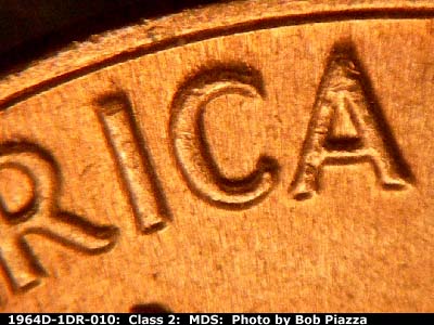 Die-stage B marker on 1964D•1DR•010 (1964 Doubled Die Reverse).