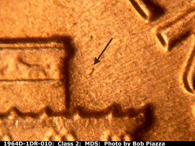 Die-stage B marker on 1964D•1DR•010 (1964 Doubled Die Reverse).