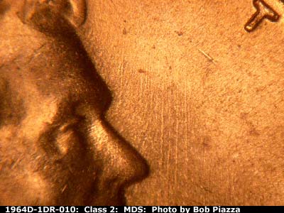Die-stage B marker on 1964D•1DR•010 (1964 Doubled Die Reverse).