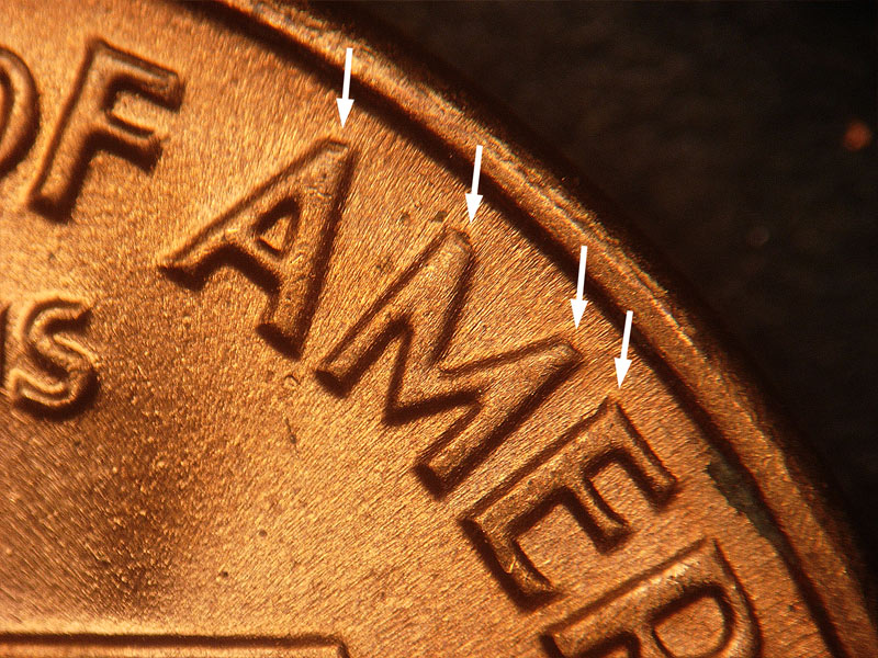 Die-stage B marker on 1964D•1DR•012 (1964 Doubled Die Reverse).