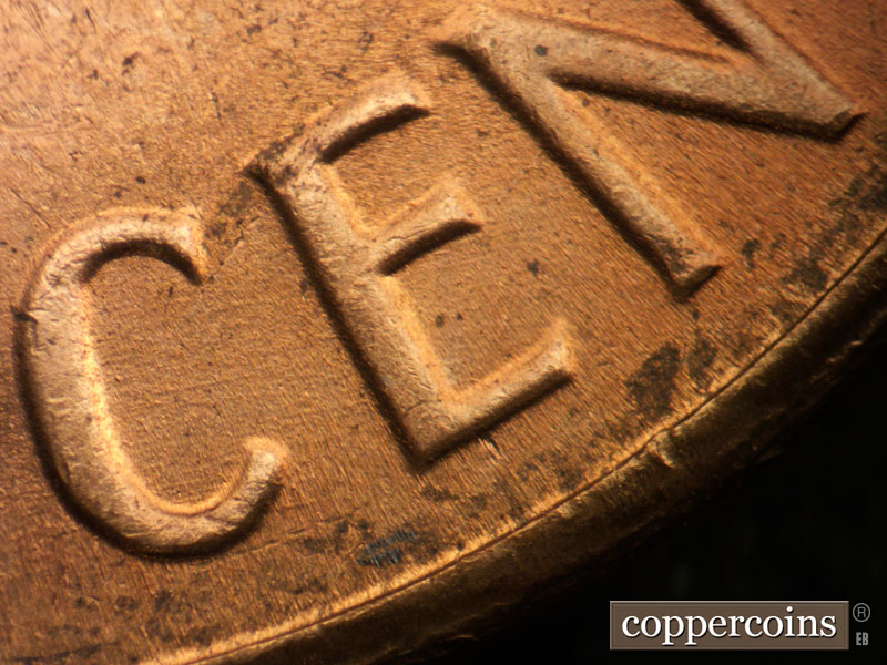 Die-stage B marker on 1964D•1DR•013 (1964 Doubled Die Reverse).