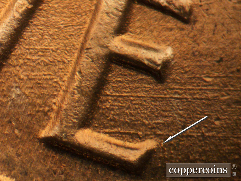 Die-stage B marker on 1964D•1DR•013 (1964 Doubled Die Reverse).