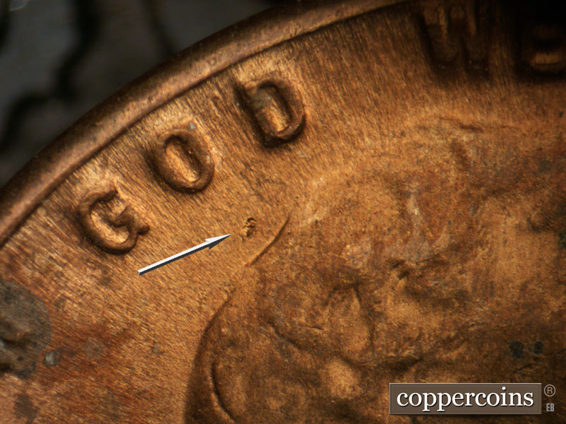 Die-stage B marker on 1964D•1DR•013 (1964 Doubled Die Reverse).