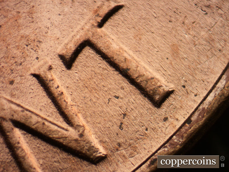 Die-stage B marker on 1964D•1DR•014 (1964 Doubled Die Reverse).