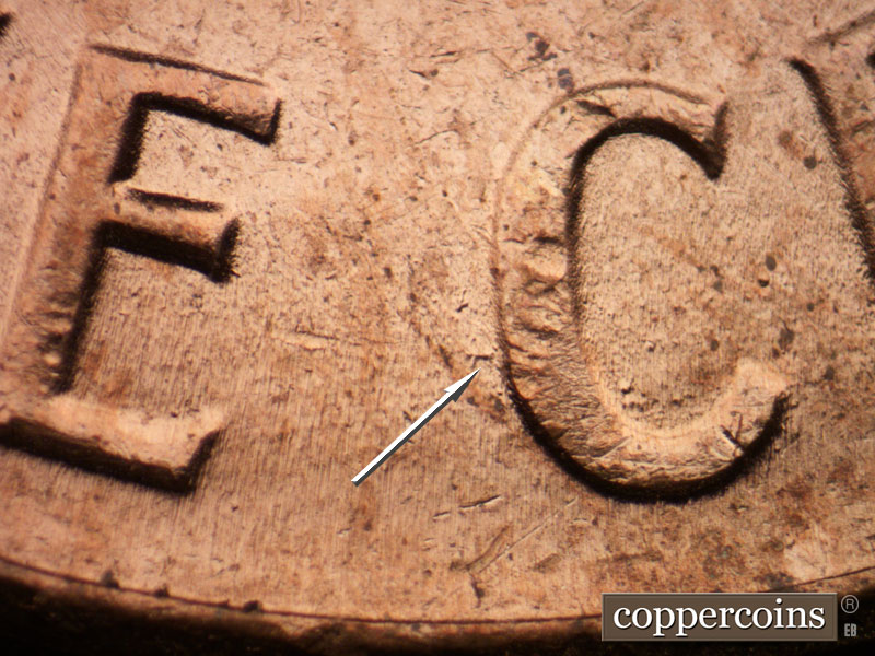 Die-stage B marker on 1964D•1DR•014 (1964 Doubled Die Reverse).