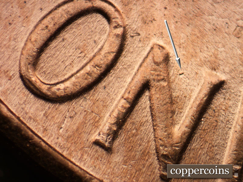 Die-stage B marker on 1964D•1DR•014 (1964 Doubled Die Reverse).