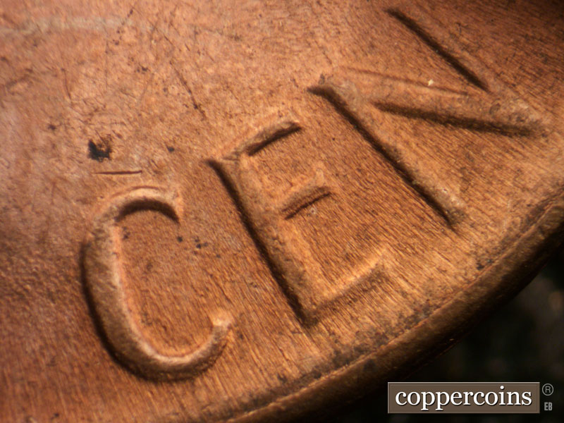 Die-stage C marker on 1964D•1DR•015 (1964 Doubled Die Reverse).