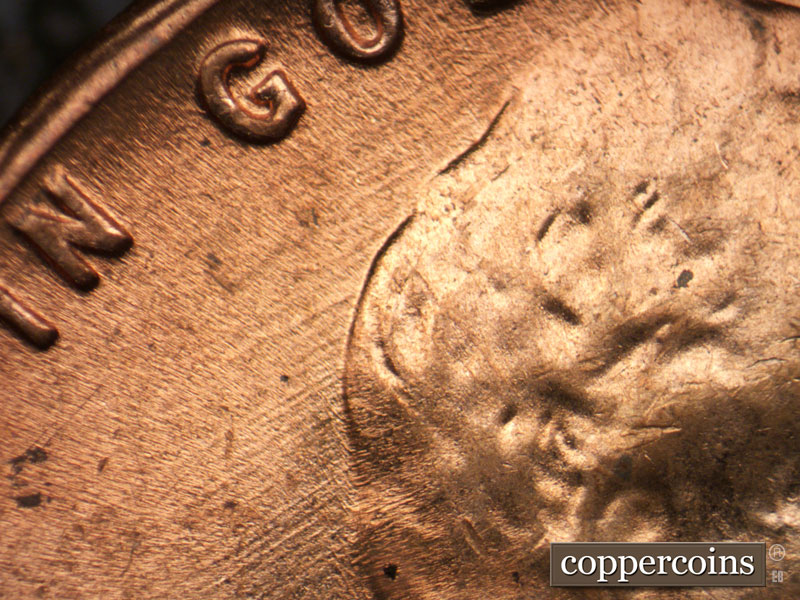 Die-stage C marker on 1964D•1DR•015 (1964 Doubled Die Reverse).