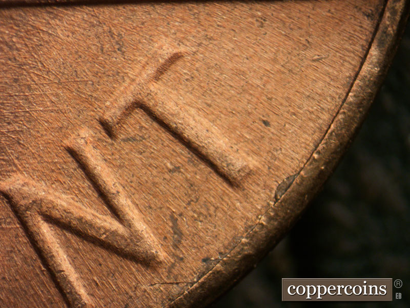 Die-stage B marker on 1964D•1DR•016 (1964 Doubled Die Reverse).