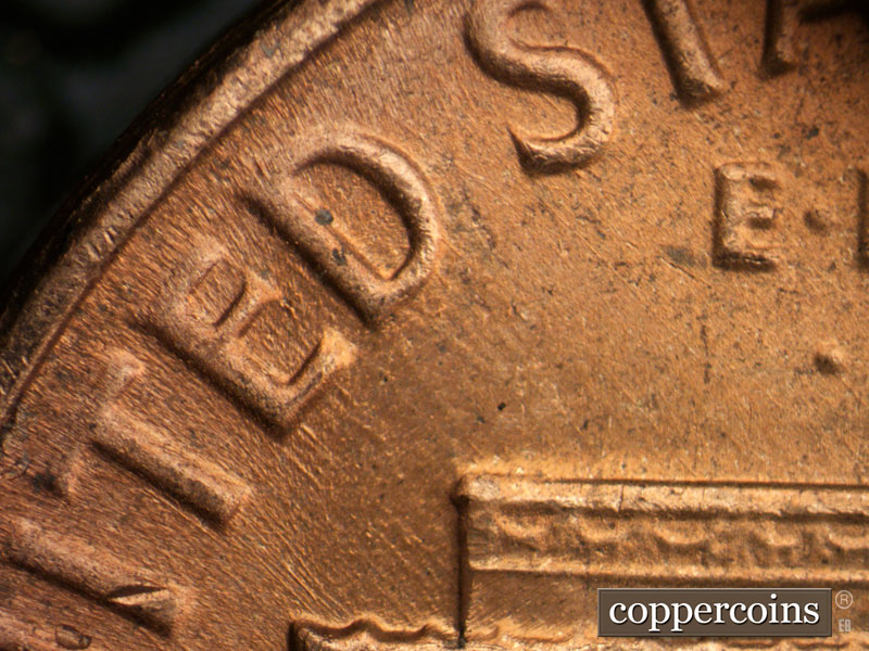 Die-stage B marker on 1964D•1DR•016 (1964 Doubled Die Reverse).