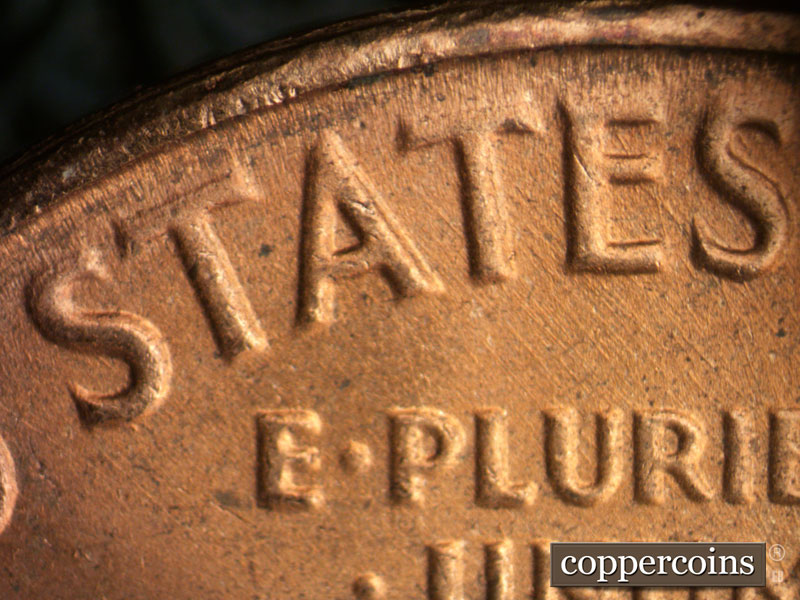 Die-stage B marker on 1964D•1DR•016 (1964 Doubled Die Reverse).