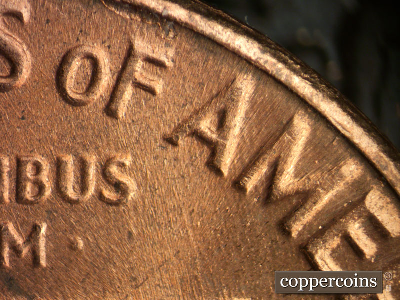 Die-stage B marker on 1964D•1DR•016 (1964 Doubled Die Reverse).
