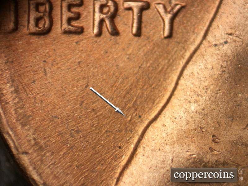 Die-stage B marker on 1964D•1DR•016 (1964 Doubled Die Reverse).