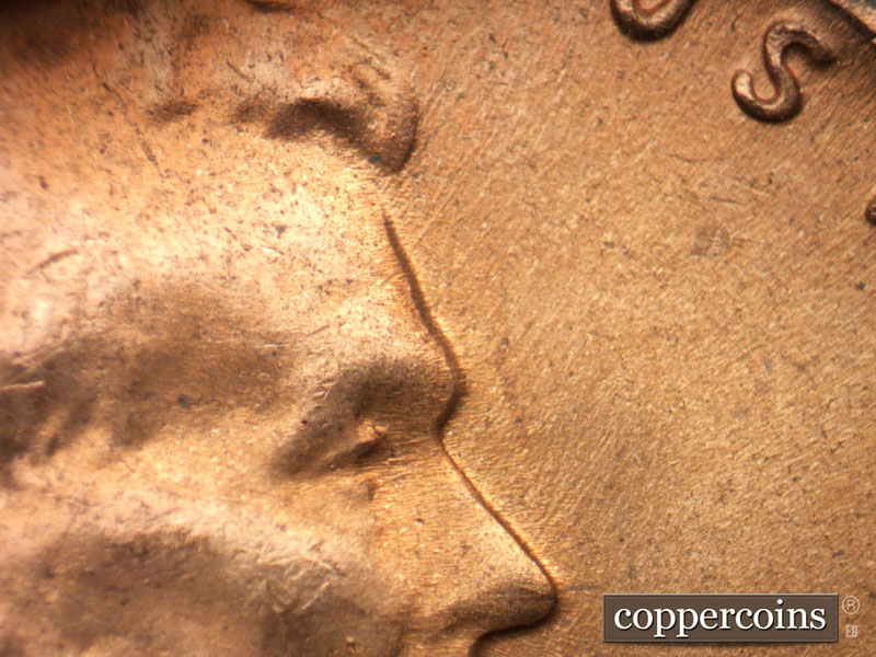 Die-stage B marker on 1964D•1DR•016 (1964 Doubled Die Reverse).