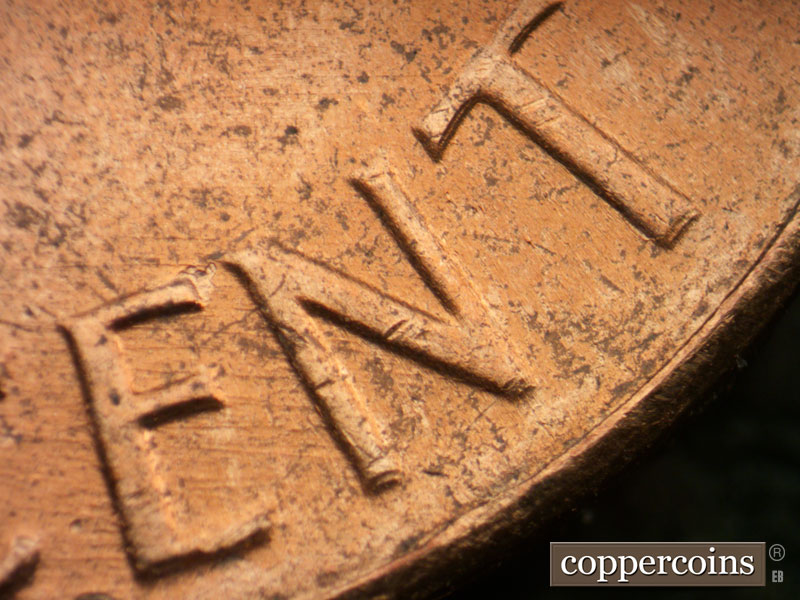 Die-stage C marker on 1964D•1DR•017 (1964 Doubled Die Reverse).