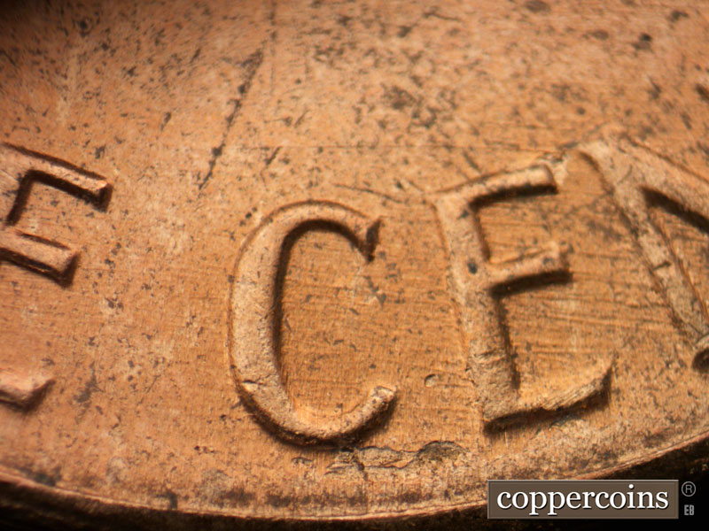 Die-stage C marker on 1964D•1DR•017 (1964 Doubled Die Reverse).
