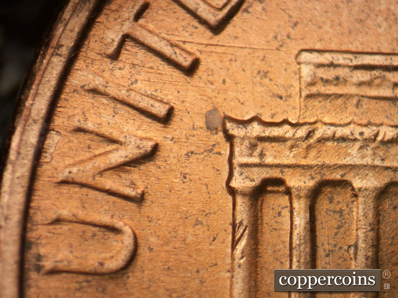 Die-stage C marker on 1964D•1DR•017 (1964 Doubled Die Reverse).