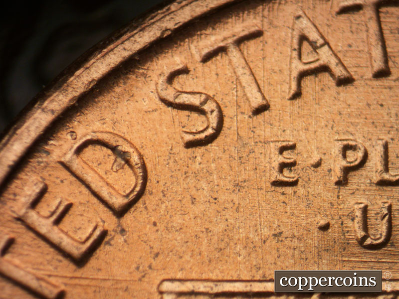 Die-stage C marker on 1964D•1DR•017 (1964 Doubled Die Reverse).
