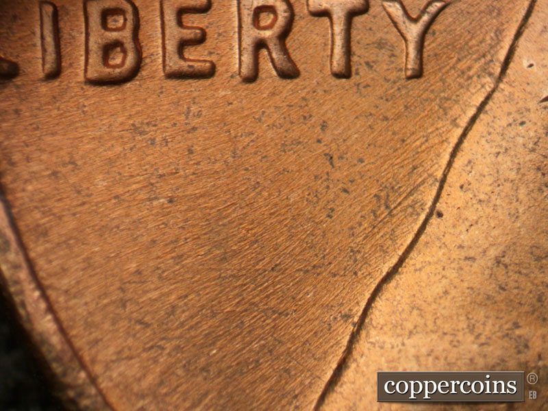 Die-stage C marker on 1964D•1DR•017 (1964 Doubled Die Reverse).