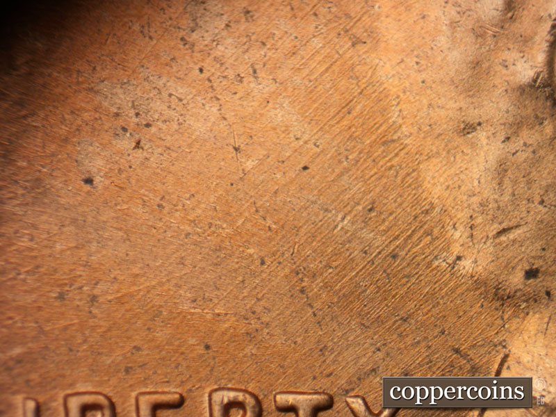 Die-stage C marker on 1964D•1DR•017 (1964 Doubled Die Reverse).