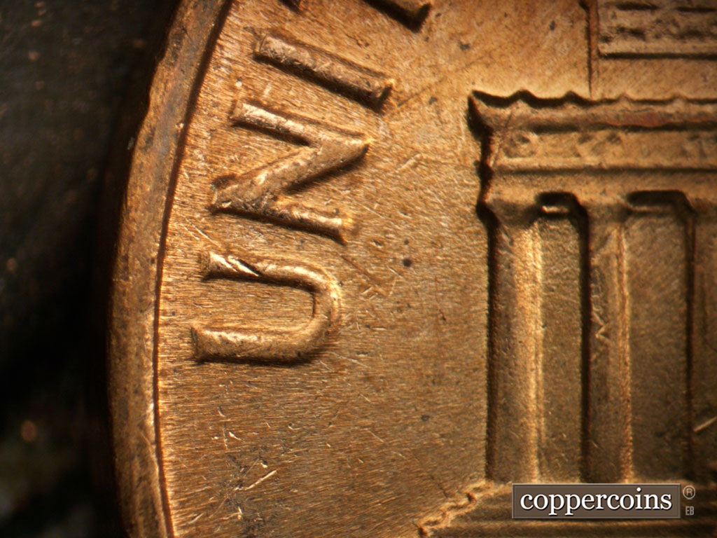 Die-stage B marker on 1964D•1DR•018 showing Doubling on UNI in UNITED.