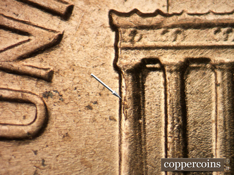 Die-stage B marker on 1964D•1MM•002 (1964 Repunched Mint Mark).