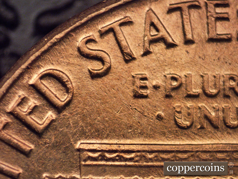 Die-stage B marker on 1964D•1MM•004 (1964 Repunched Mint Mark).