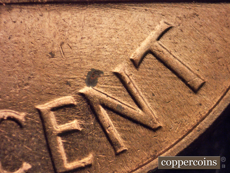Die-stage B marker on 1964D•1MM•004 (1964 Repunched Mint Mark).
