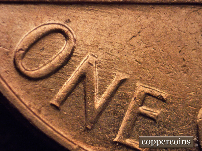 Die-stage B marker on 1964D•1MM•004 (1964 Repunched Mint Mark).