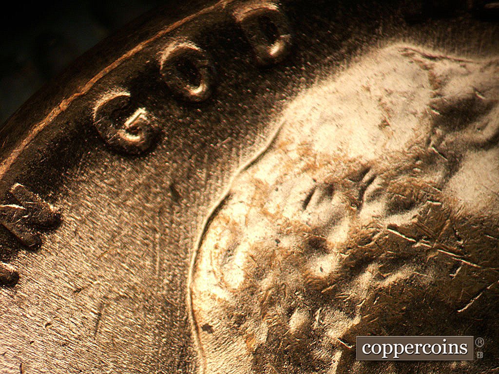 Die-stage C marker on 1964D•1MM•005 showing N/S die scratches under GOD.