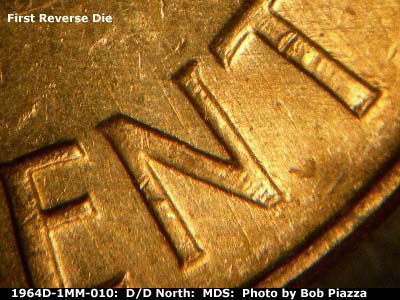 Die-stage B marker on 1964D•1MM•010 (1964 Repunched Mint Mark).
