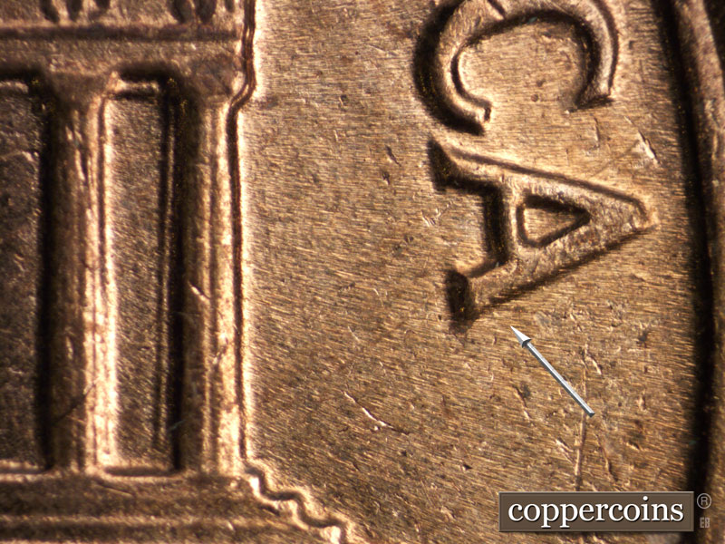 Die-stage B marker on 1964D•1MM•013 (1964 Repunched Mint Mark).