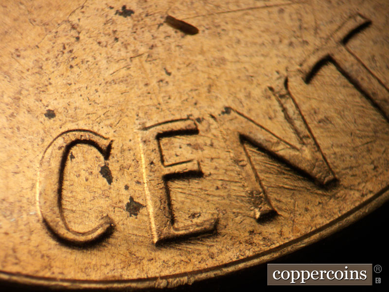 Die-stage B marker on 1964D•1MM•018 (1964 Repunched Mint Mark).