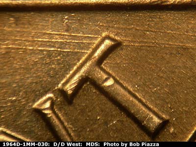 Die-stage B marker on 1964D•1MM•030 (1964 Repunched Mint Mark).
