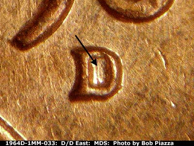 Die-stage B marker on 1964D•1MM•033 (1964 Repunched Mint Mark).
