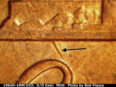 Die-stage B marker on 1964D•1MM•033 (1964 Repunched Mint Mark).