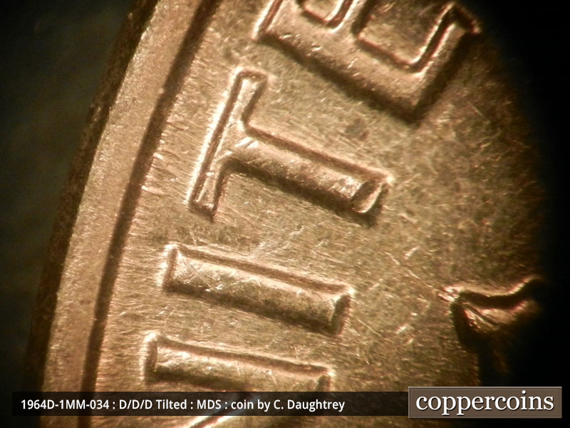 Die-stage B marker on 1964D•1MM•034 (1964 Repunched Mint Mark).