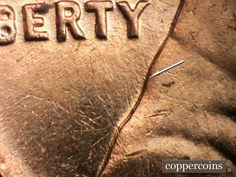 Die-stage B marker on 1964D•1MM•039 (1964 Repunched Mint Mark).