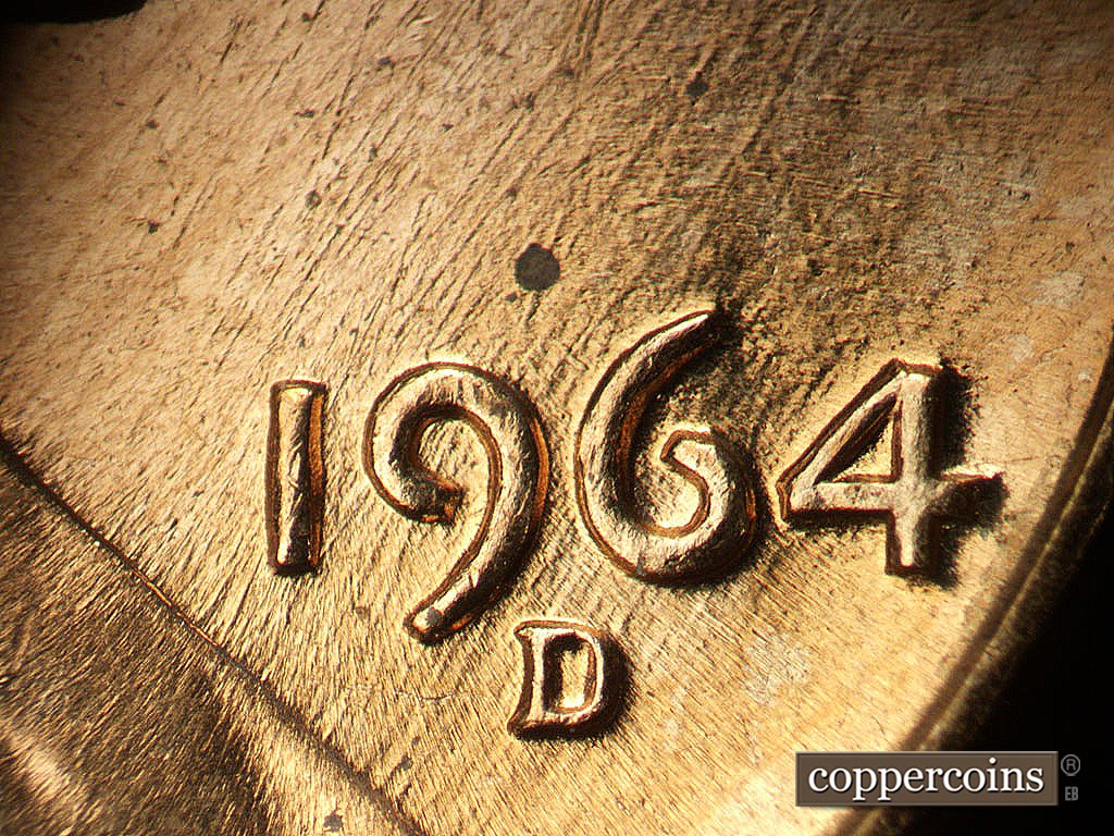 Die-stage B marker on 1964D•1MM•040 showing SW die scratches through date.