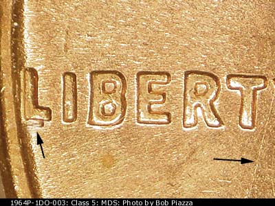 Die-stage B marker on 1964P•1DO•003 (1964 Doubled Die Obverse).