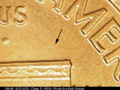 Die-stage B marker on 1964P•1DO•003 (1964 Doubled Die Obverse).