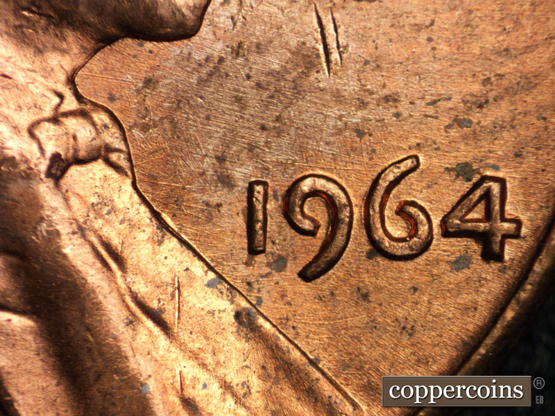 Die-stage B marker on 1964P•1DO•005 (1964 Doubled Die Obverse).